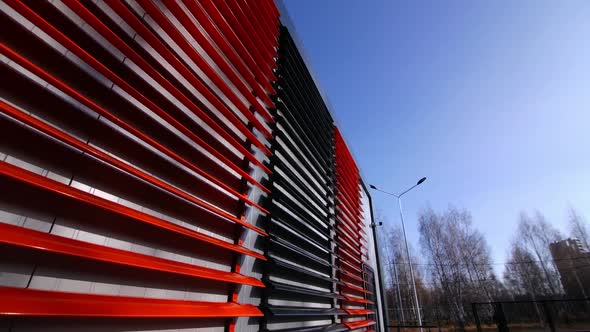 Entrance of Public Building Closed with Black Red Shutters