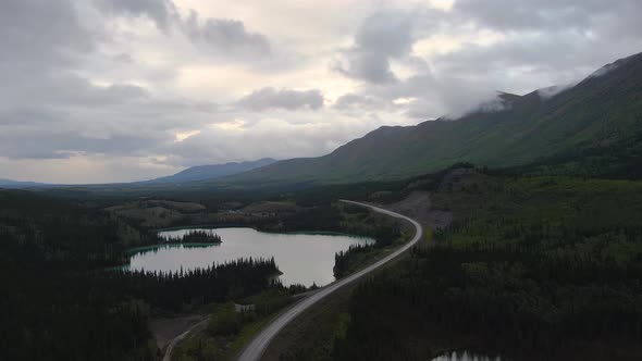View of Peaceful Lakes and Scenic Road From Above