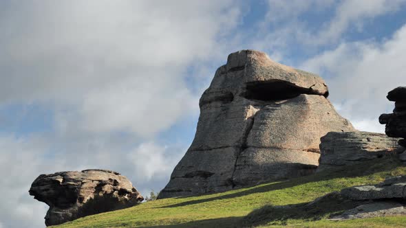 Huge Stone Idol Against the Blue Sunny Sky