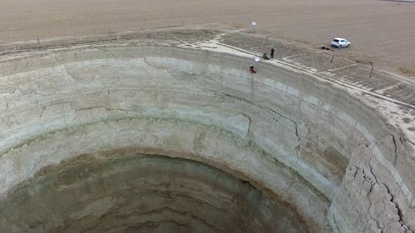 Researchers Entering a Deep Sinkhole are Going Down by Rope