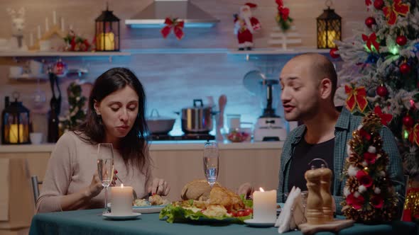 Couple Talking on Video Call Conference Enjoying Festive Dinner