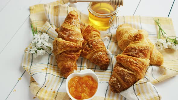 Croissants and Condiments Composition