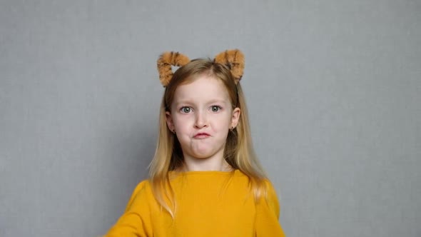 Cute Smiling Blond Girl with Tiger Ears