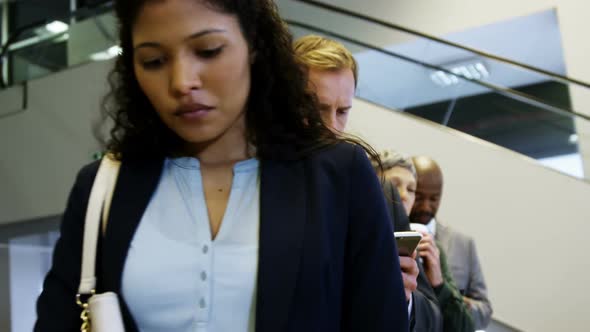 Business people standing in a line