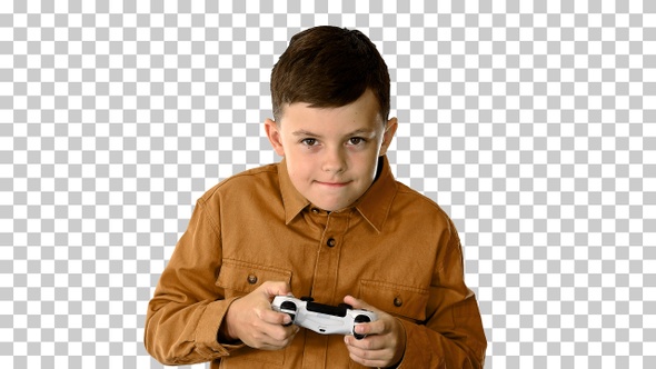 Emotional little boy playing video games, Alpha Channel