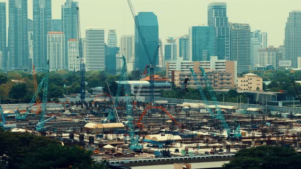 Panoramic View of Cityscape and Construction Site in Metropolis