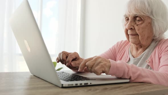 Senior Woman with Laptop