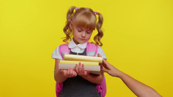 Tired Pupil Girl Holding Heavy Stack of Books in Hands Looking Unhappy Sad From a Lot of Homework