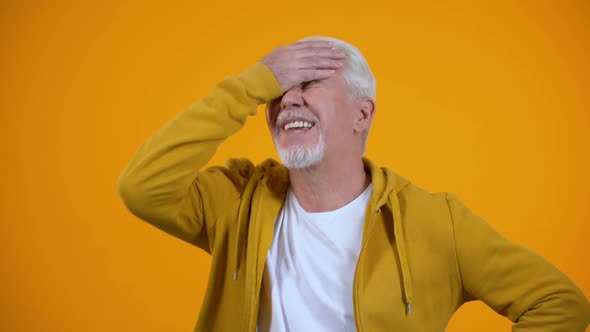 Upset Aged Man Demonstrating Face-Palm Gesture, Failure Sign, Elderly Loser