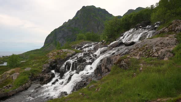 Waterfall Behind the Village of Sorvagen on the Lofoten Islands Norway