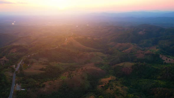 4K Aerial view over beautiful mountains. beautiful sunset over high mountains
