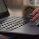 Woman with Manicure Slides Touchpad of Expensive Laptop - VideoHive Item for Sale