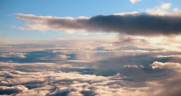 Clouds and Sky View From the Plane the Plane Flies High in the Sky Above the Clouds