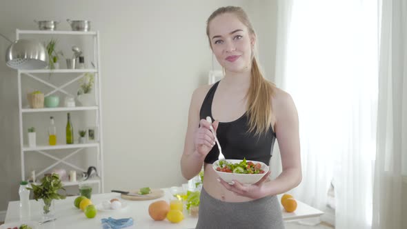 Beautiful Thin Caucasian Girl Posing with Organic Salad