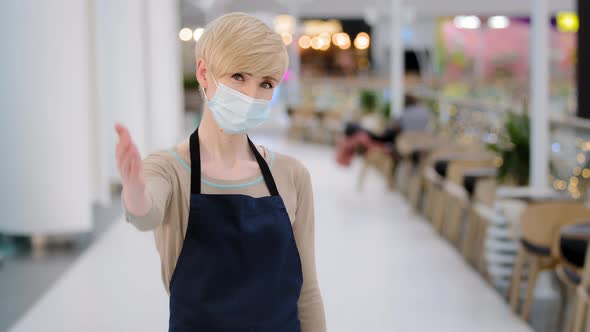 Cheerful Caucasian Waitress Female Waiter Woman in Medical Mask Inviting Visitors Happy Saleswoman