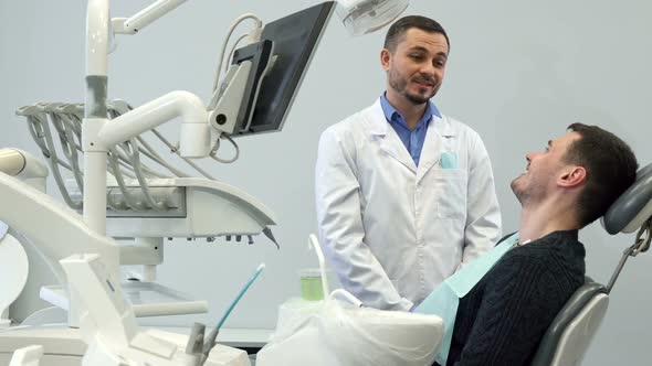 Dentist Talks To His Male Client