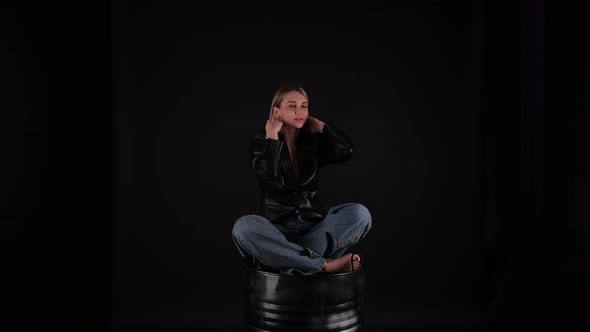 Girl Sitting on a Chair Dancing