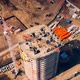 Aerial Flight Over New Constructions Development Site with High Tower Cranes - VideoHive Item for Sale