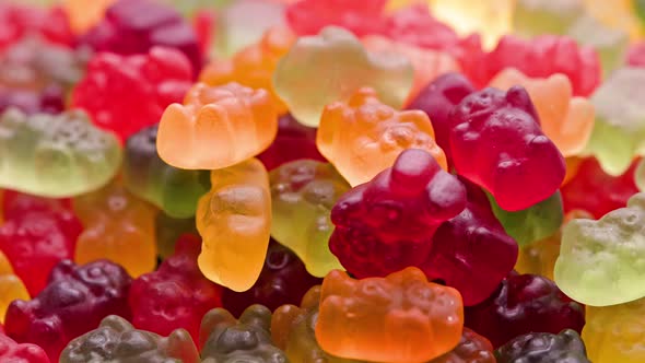 Full Frame Looped Spinning Background of Colorful Jelly Bear Candies