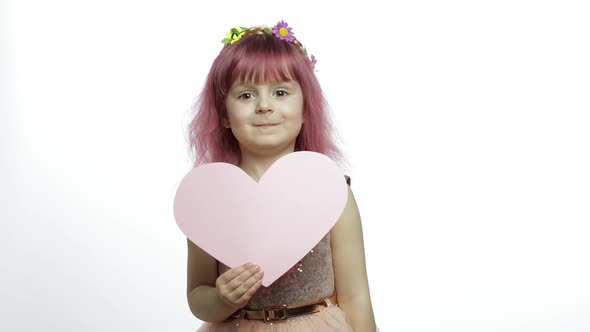 Child Girl Princess Holds Pink Paper Heart. Mothers Day, Valentines Day Concept