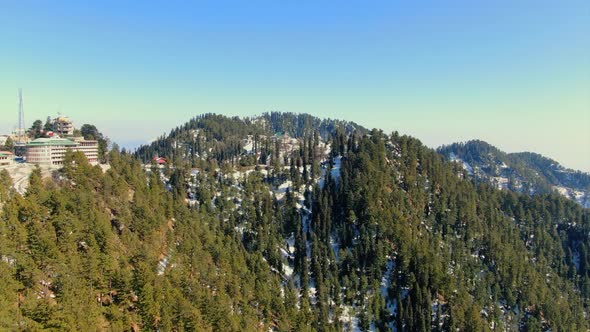 Flying by the resort town of Changla Gali in Pakistan