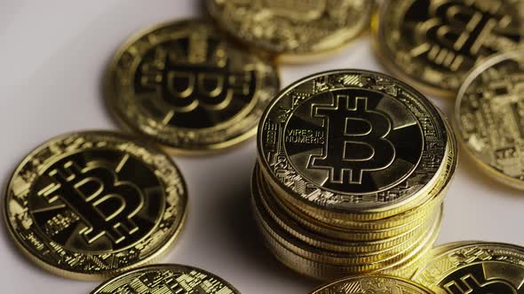Rotating shot of Bitcoins (digital cryptocurrency) - BITCOIN 0428