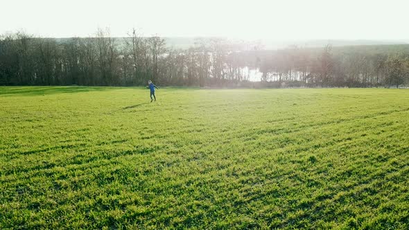 Little Boy in the Green Field