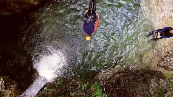 Aerial view of person jumping off in Soca river, Slovenia