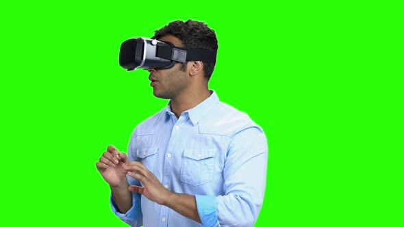 Portrait of Young Scared Man Using Virtual Reality Glasses