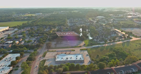 Aerial View of Residential Houses and Driveways Neighborhood During a Fall Sunset in Houston Texas