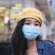 Asian woman standing outdoor wearing protective mask, covid-19 world pandemic - VideoHive Item for Sale