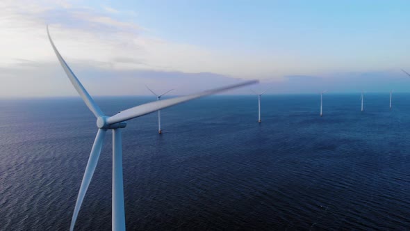 Windmill Park in the Ocean Drone Aerial View of Windmill Turbines Generating Green Energy Electric