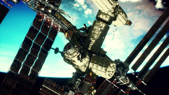 International Space Station Over the Planet Elements Furnished By NASA alt