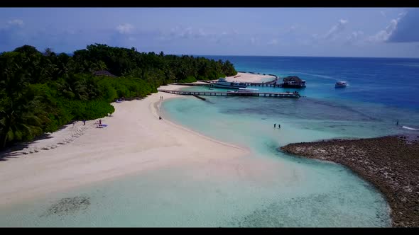 Aerial landscape of tropical lagoon beach time by blue water with clean sandy background of a dayout