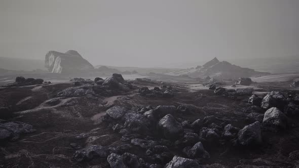 Foggy Mountain Landscape with Snow Cornice Over Abyss Inside Cloud