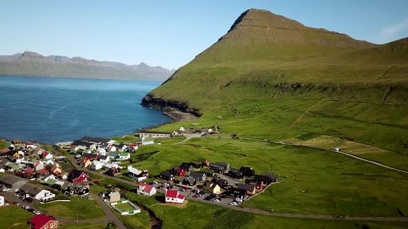 Aerial View of Gjogv Village and Tyril Mountain in Faroe Islands