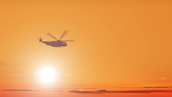 Dark Silhouette of Military Helicopter Flies at Sunset