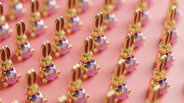 Loopable animation of cute chocolate jumping Easter bunnies.  Happy Easter.