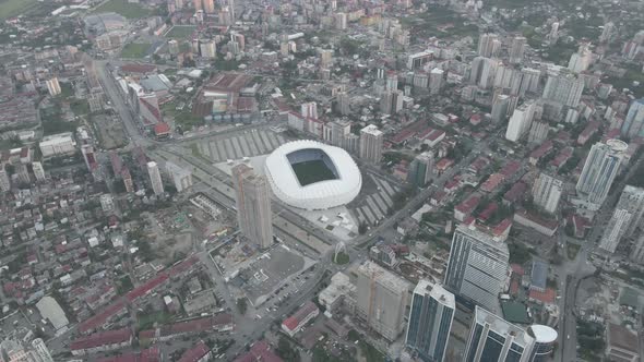 Aerial shot of Dinamo Batumi Stadium near Heroes Square against cityscape