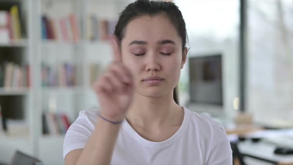 Portrait of No Finger Gesture By Young Asian Woman