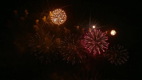 Colorful Firework display at night on sky background