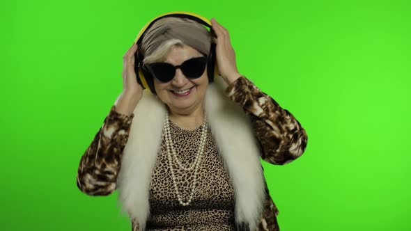 Elderly Grandmother. Caucasian Woman. Dance, Celebrate, Listen Music. Chroma Key