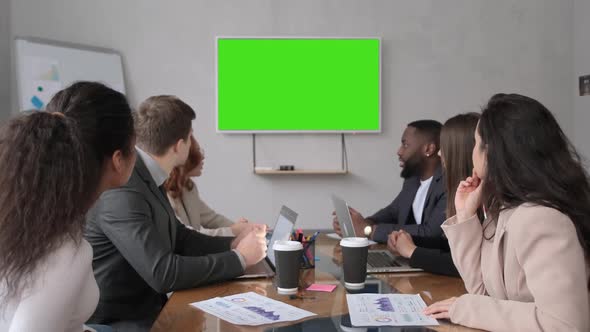 Business People Sitting in Conference Room for Profession Seminar and Stare at a Blank Screen
