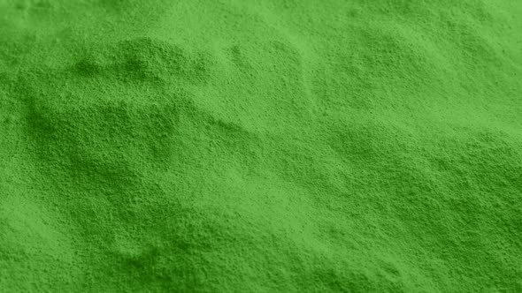 Powder Green Colored Material Tracking Shot