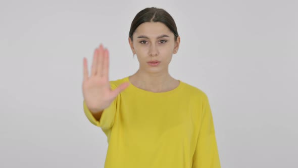 Stopping Spanish Woman on White Background