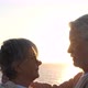 Portrait of couple of two happy seniors and mature and old people at the beach together - VideoHive Item for Sale