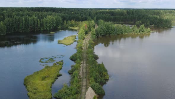 Flight Over the Taiga Forest Lake