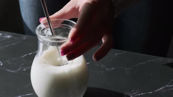 Beat the Milk in a Mug Using a Frother