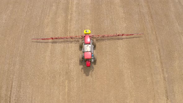 crop dusting tractor bird eye view