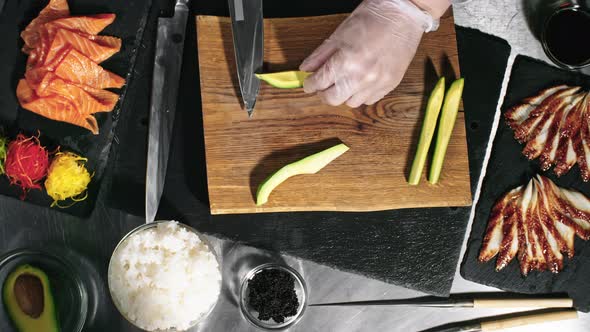 Cook Peeling Fresh Avocado